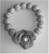 Gray and white polymer clay stretch bracelet.