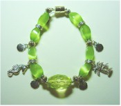 Green Crystal Glass and Silver ocean charms bracelet.