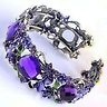 Purple resin crystal cuff bracelet.