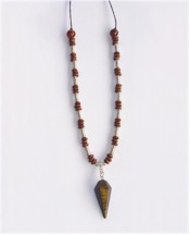 Tiger Eye pendulum suspended on necklace of wood and silver.