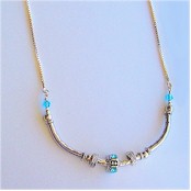 Aquamarine birthstones, Swarovski Crystals on Silver necklace.