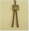 Brass pendulums swing from brass pendant necklace.