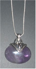 Polished Amethyst and Sterling Silver pendant necklace.