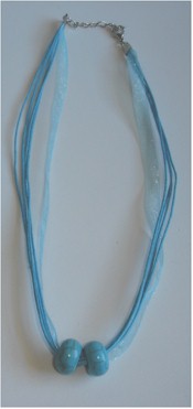 Turquoise Howlite beads on aqua silk ribbons necklace.