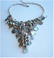 Silver peacock, freshwater pearls and mother of pearl disks necklace.