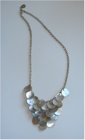 Silvery abalone disks cascade from chain necklace. Vintage Signed piece.