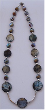 Abalone shell coins and silver necklace.