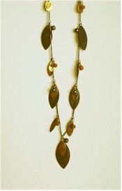 Vintage metal leaves and beads in autumn colors on unique chain.